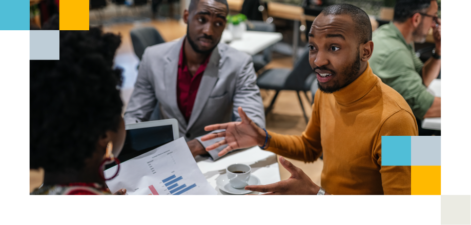 Colleagues discuss a bar chart over coffee; man in a mustard turtleneck explains options in a team meeting.